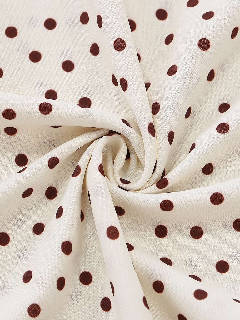 Close-up of fabric with polka dots on a white background