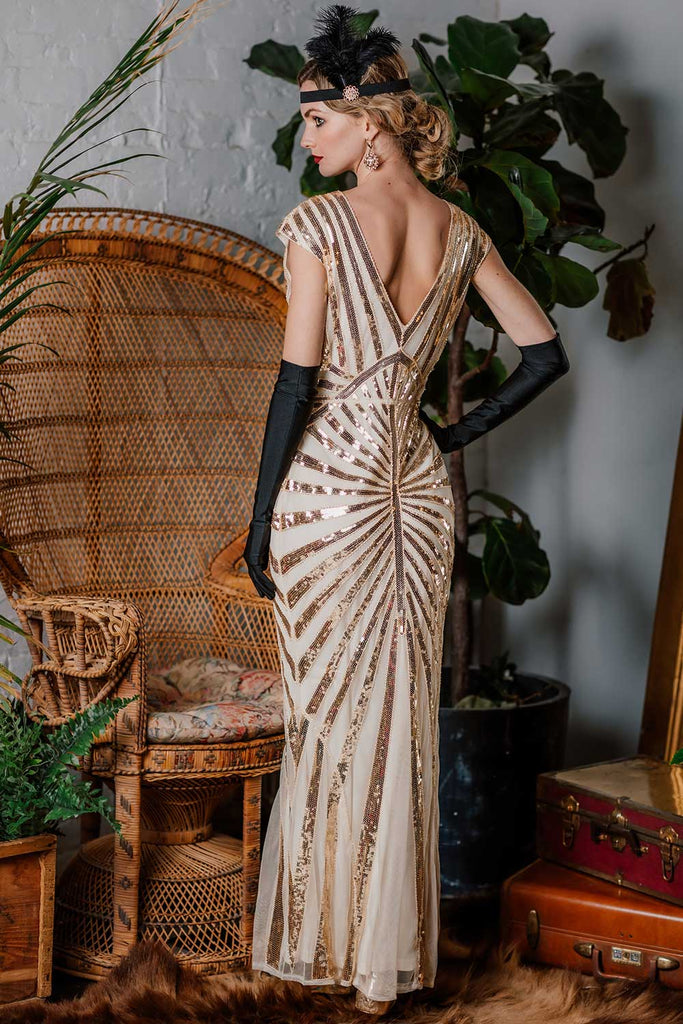 This 1920s Sequin Art Deco Maxi Dress wraps her in 1920s elegance, one twirl at a time