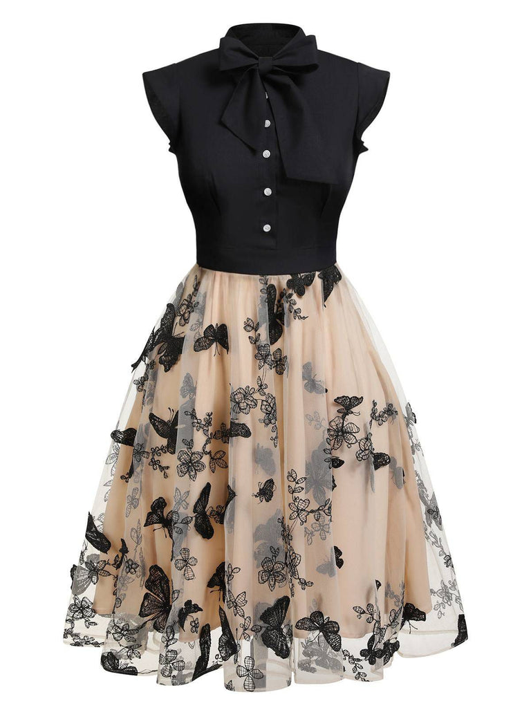 Black 1950s Butterfly Patchwork Vintage Dress — vintage elegance for the modern woman