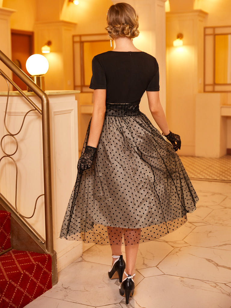 Black 1950s Polka Dot Swing Dress — vintage elegance for the modern woman