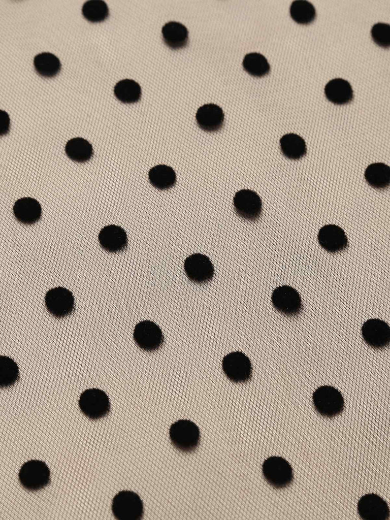 Black 1950s Polka Dot Swing Dress — vintage elegance for the modern woman