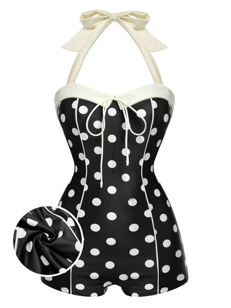 Front view: 1950s Black 1950s Polka Dots Halter Swimsuit, perfect for vintage themed parties and retro fashion enthusiasts