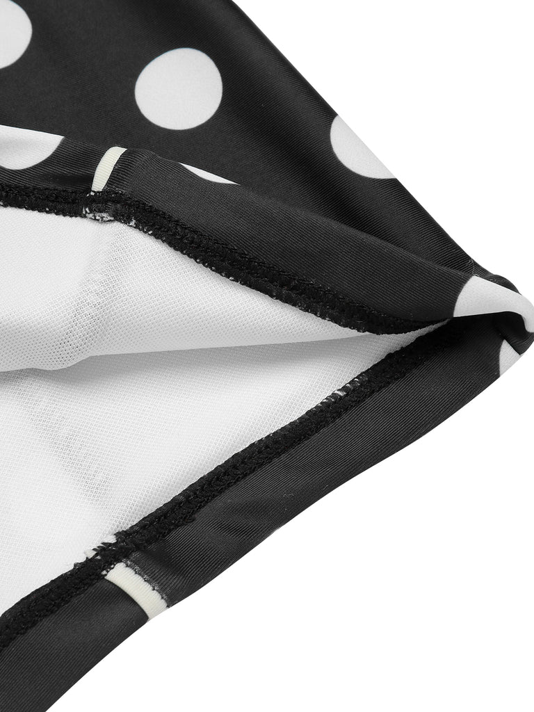 Close-up: 1950s Black 1950s Polka Dots Halter Swimsuit, perfect for vintage themed parties and retro fashion enthusiasts