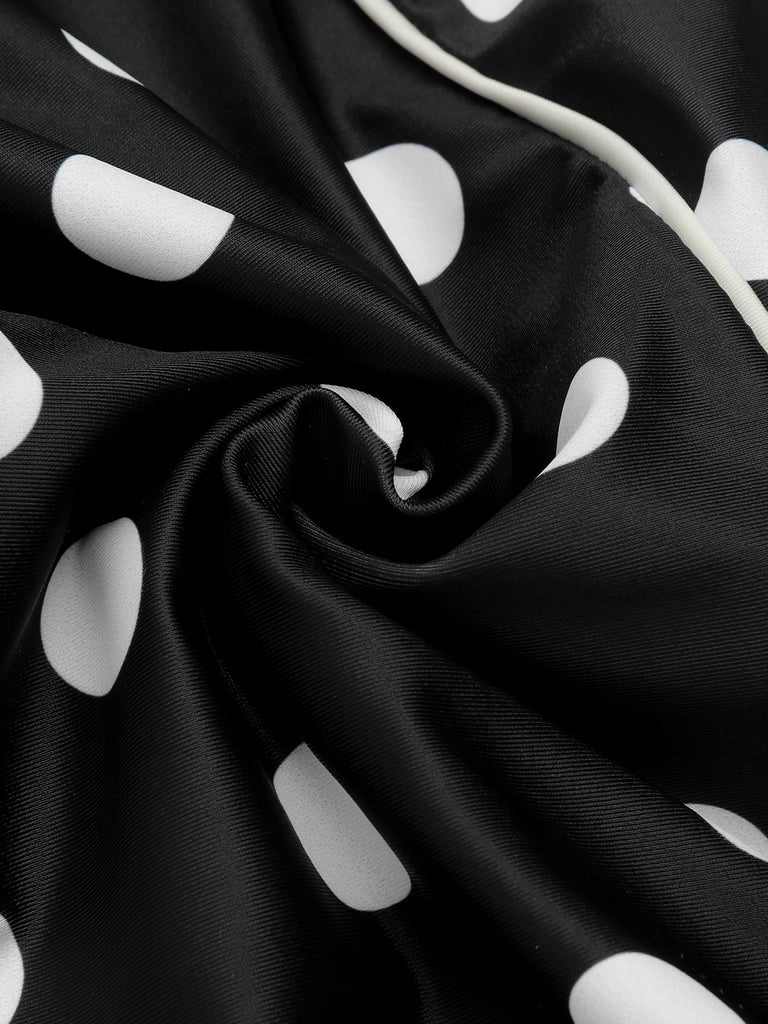 Close-up: 1950s Black 1950s Polka Dots Halter Swimsuit, perfect for vintage themed parties and retro fashion enthusiasts