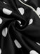 Close-up: 1950s Black 1950s Polka Dots Halter Swimsuit, perfect for vintage themed parties and retro fashion enthusiasts