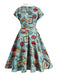 Blue 1950s Button Comics Swing Dress — vintage elegance for the modern woman