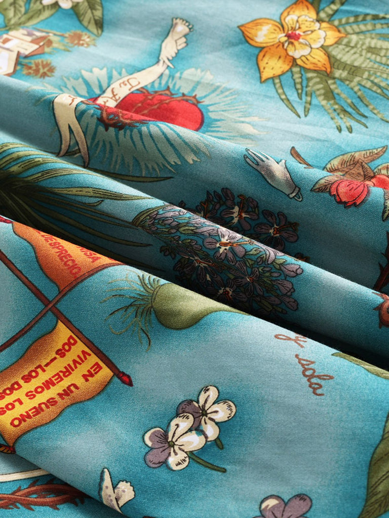 Blue 1950s Button Comics Swing Dress — vintage elegance for the modern woman