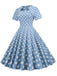 Blue 1950s Polka Dot Swing Vintage Dress — vintage elegance for the modern woman