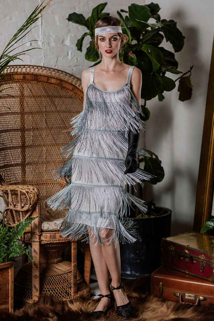 This [Clearance] Belted Gray 1920s Fringe Gatsby Dress wraps her in 1920s elegance, one twirl at a time
