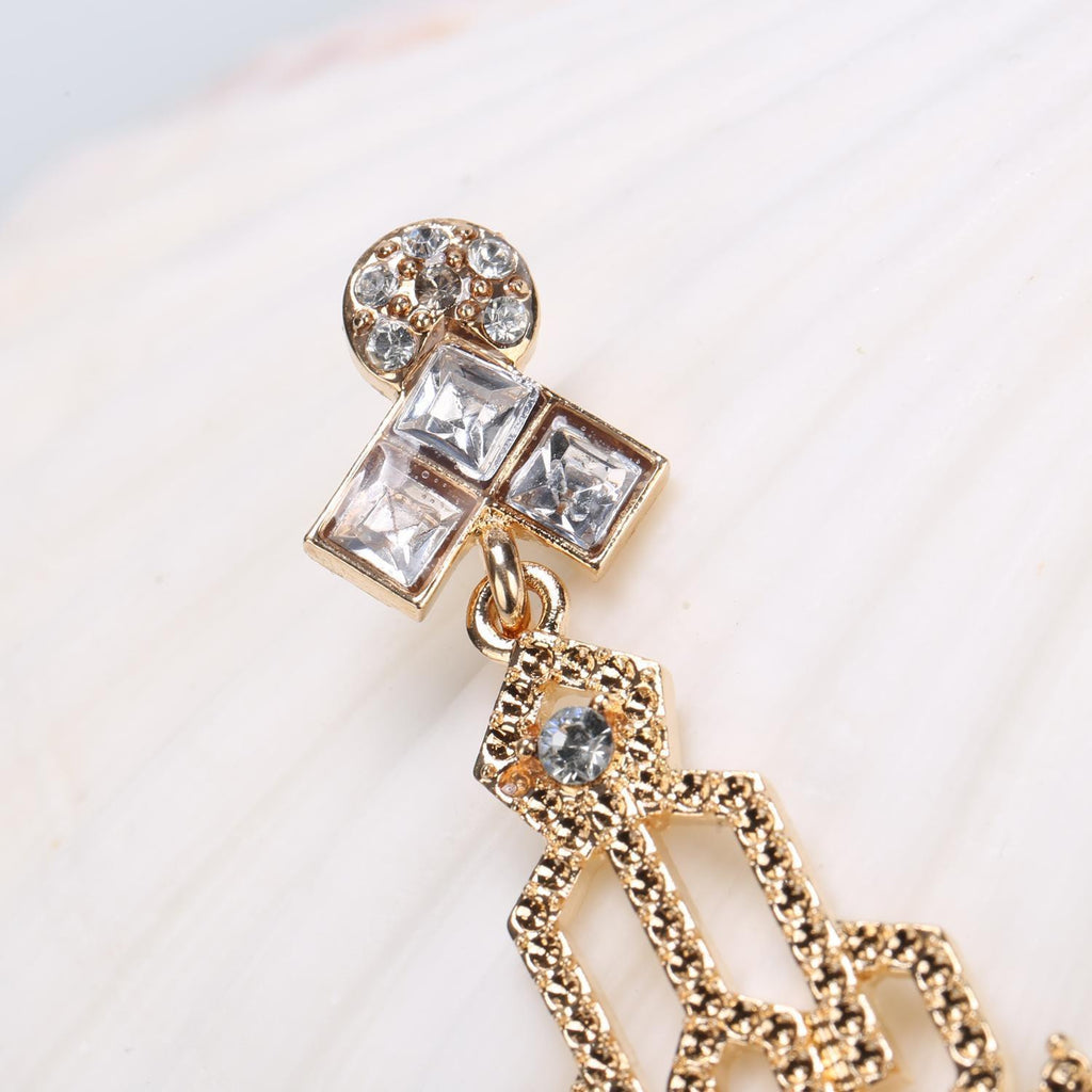 This Gold 1920s Hollow Out Dangle Earrings carries 1920s stories waiting to be told