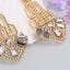 Gold 1920s Hollow Out Dangle Earrings — 1920s elegance in the palm of her hand