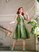 Green 1950s Off-Shoulder Vintage Dress — vintage elegance for the modern woman