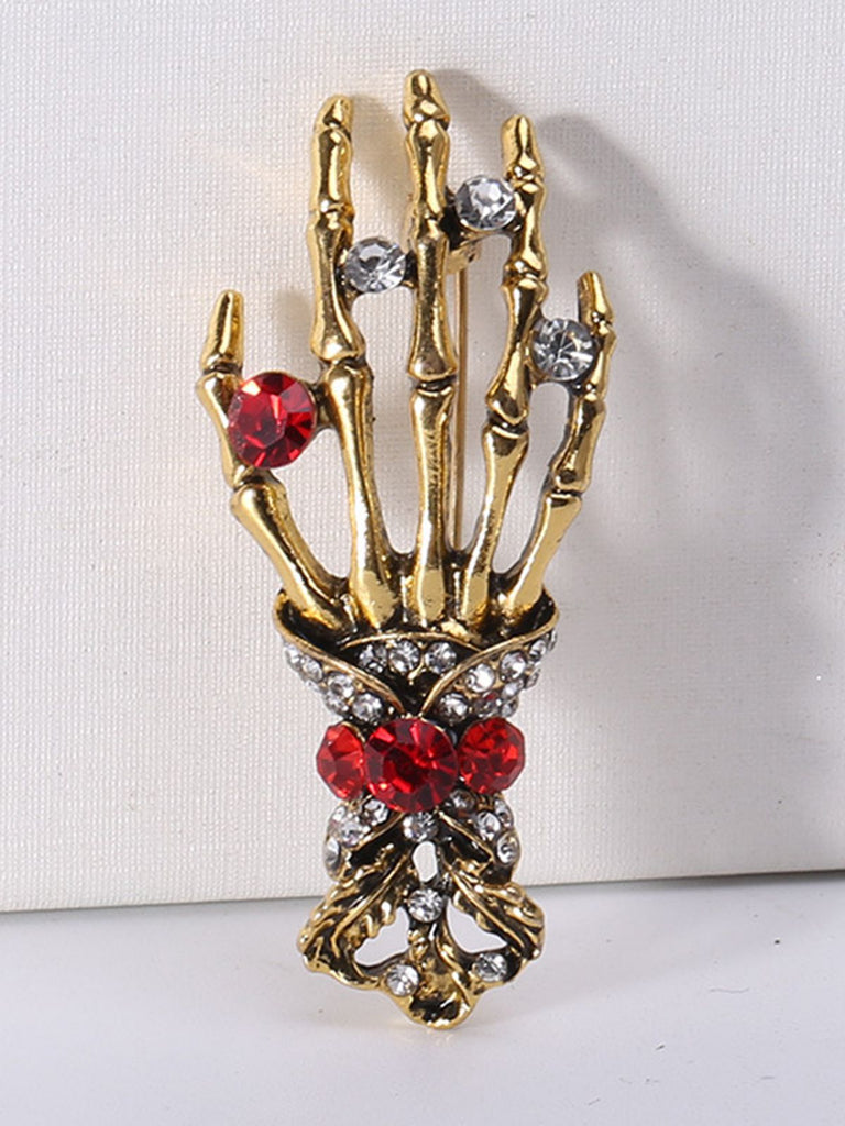Retro Halloween Skeleton Hand Brooch — vintage elegance for the modern woman