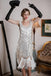 This White 1920s Fringed Flapper Dress wraps her in 1920s elegance, one twirl at a time