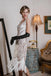 White 1920s Fringed Flapper Dress — the kind of 1920s dress that makes strangers smile